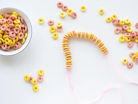 Bracelet made with froot ring shaped cereal for Mothers day Stock Photos