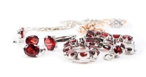 Bracelet with the ruby stones on the white Stock Photos