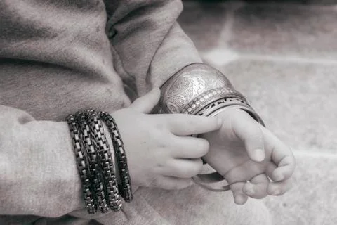 Bracelets on a child's hands Stock-Fotos