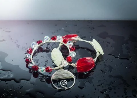 BRACELETS  ON A TABLE Stock Photos