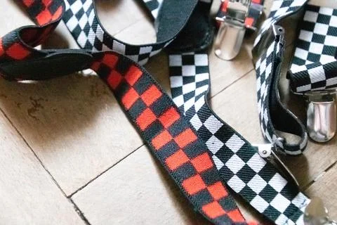 Braces plaid black and withe and black and red close up Stock Photos