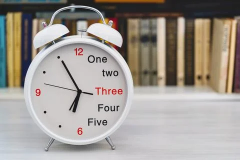 Bracket clock the alarm clock closeup in the foreground Foto stock