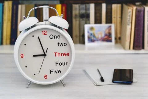 Bracket clock the alarm clock closeup in the foreground Foto stock