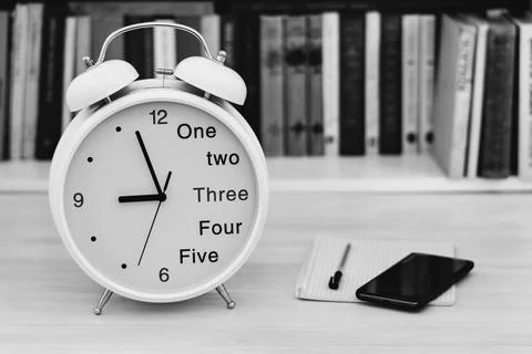 Bracket clock the alarm clock closeup in the foreground Stock Photos