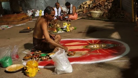 Brahman drawing a rangoli depicting divinity of Narasimha Stock Footage 71194425