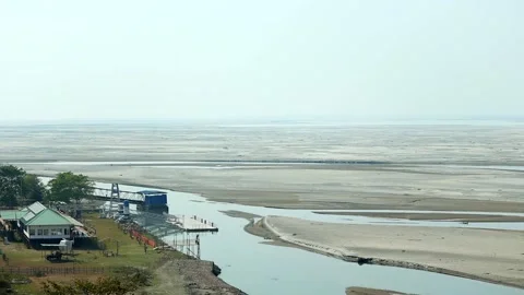 Brahmaputra river landscape with riverside infrastructure in Dibrugarh Stock-Footage 330708573