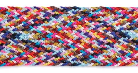 A braid of multi colored sewing threads on a white background Stock-Fotos