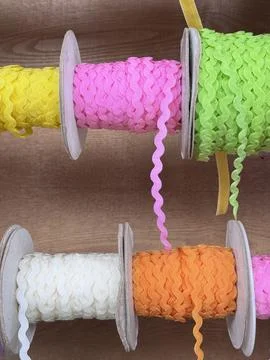 Braid for sewing and crafting on spools Stock Photos
