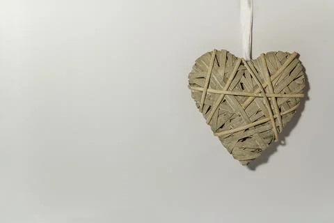 Braided heart on a gray background theme Love and St Valentines Day Copy space Foto stock