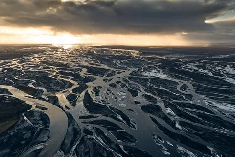 Braided river patterns flowing through a icelandic landscape Stock Photos