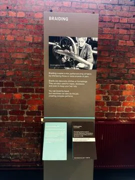 Braiding exhibit panel at Science and Industry Museum showing historic brai.. Stock Photos