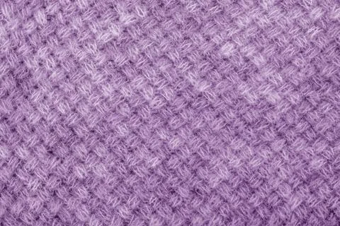 Braids in machine knitting pattern Stock Photos