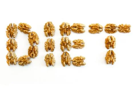 Brain and nuts on a white background, healthy eating concept Foto stock