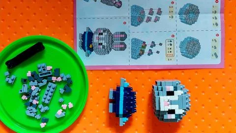 Brain-developing Lego play with customized mini figure Stock Photos