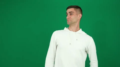 Brain explosion emotions of a handsome man guy on a green background chromakey Stock Footage 281724414