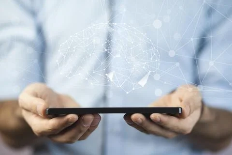Brain in man hand Stock Photos