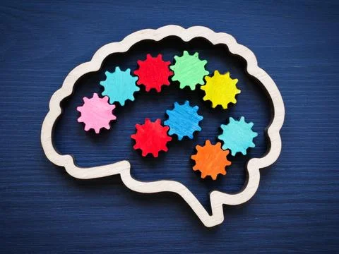 Brain outline with multicolored gears. Creativity and new ideas. Stock Photos