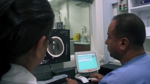 Brain scan with MRI for a patient Stock Footage 123719734