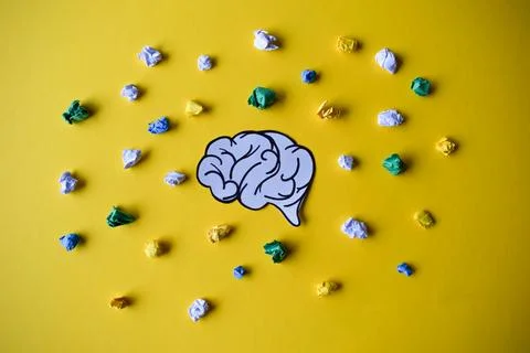 A Brain Surrounded by Crumpled Paper Stock Photos