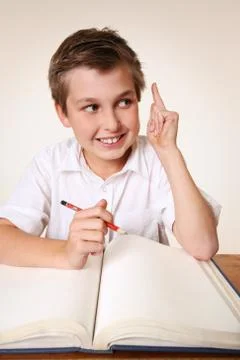Brainchild schoolboy with idea Stock Photos