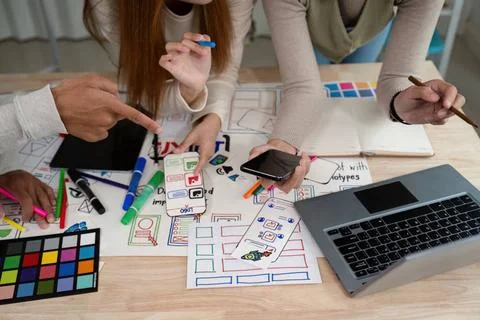 Brainstorm team of creative web graphic designer planning, Group of mobile... Stock-Fotos