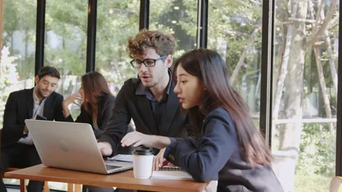 Brainstorming and cooperation talk and planning concept Stock Footage 146027009