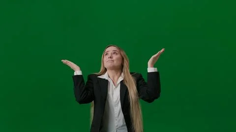 Brainstorming and problem solving concept. Female portrait on green screen. Girl Foto stock