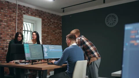Brainstorming and teamwork in office of IT-company, programmers and developers Stock Footage 233731566