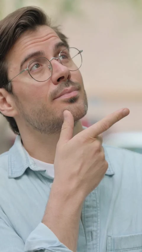 Brainstorming Casual Young Man Thinking Outdoor Vidéo 319964627