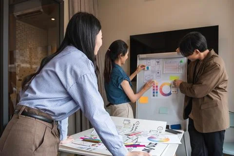 Brainstorming of a developer team, planning for group problem solving ideas Stock Photos