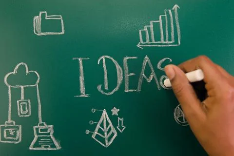 Brainstorming Ideas on Blackboard Stock Photos