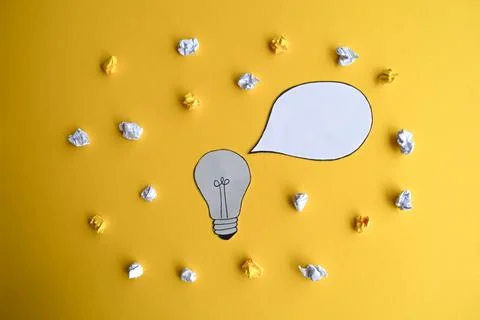 Brainstorming Ideas on Yellow Background Stock Photos