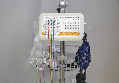BrainTest polygraph and EEG machine with electrode caps closeup. Stock Photos