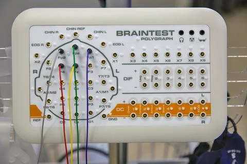 BrainTest polygraph and EEG machine with electrode caps closeup. Stock Photos
