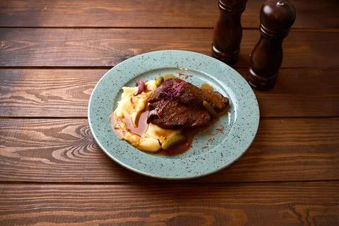 Braised Beef Steak with Mashed Potatoes Stock Photos