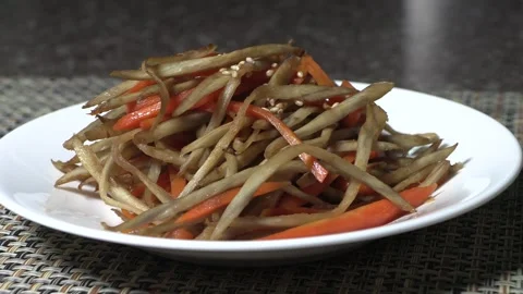 Braised burdock and carrot. Stock-Footage 293190257