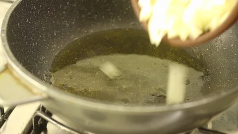 Braised chopped onion Stock Footage 128427772