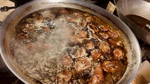 Braised Meat Boiling in Large Pot at Thai Street Food Market Видео 340351860