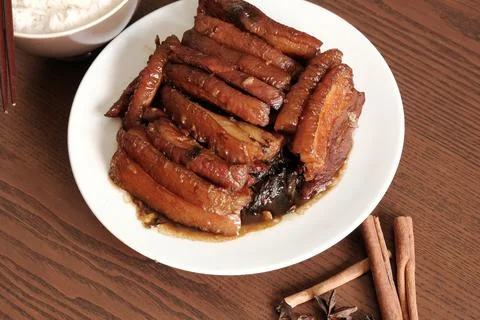 Braised Pork Belly with Pickled Cabbage and Steamed Rice on Wooden Table Stock Photos