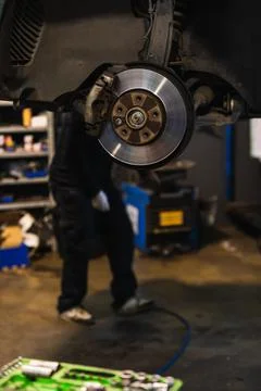 Brake calipers in the car workshop. Stock Photos