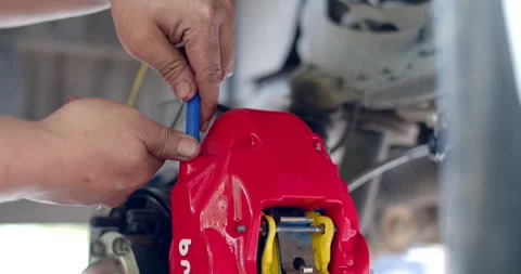 Brake fluid bleeding for new installations.Bleed brake fluid. Stock Footage 277414923