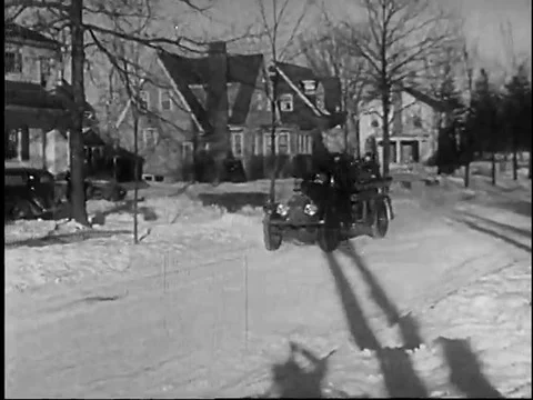 The brakes in a firetruck, a dump truck and an automobile are used to stop the Stock Footage