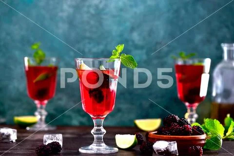 Bramble drink, front view Stock Photos