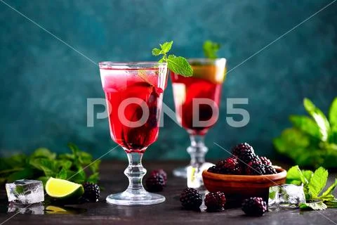 Bramble drink, front view Stock Photos