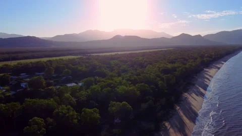 Bramston Beach elevated pan looking north at sunset Stock Footage 155526493