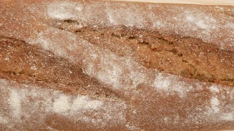 Bran baguette, close up. Bread, dolly shot. Stock Footage 148294838