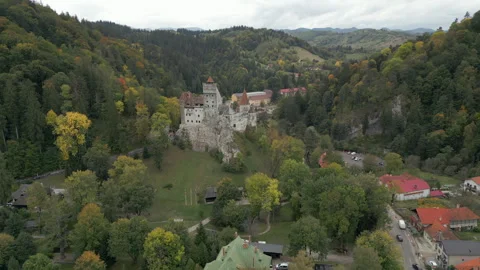 Bran Castle Home Of Dracula Nestled Among Transylvanian Mountains Romania Drone Stock Footage 337979507