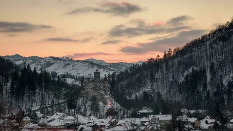 Bran castle at sunset in winter. 4k timelapse. Stock Footage 79139698