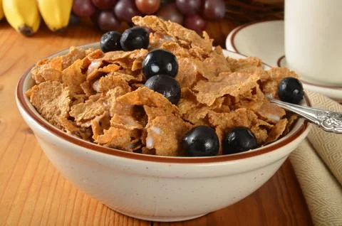 Bran flakes with blueberries Stock Photos