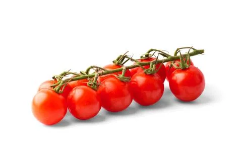 Branch of cherry tomatoes on a white background Stock Photos